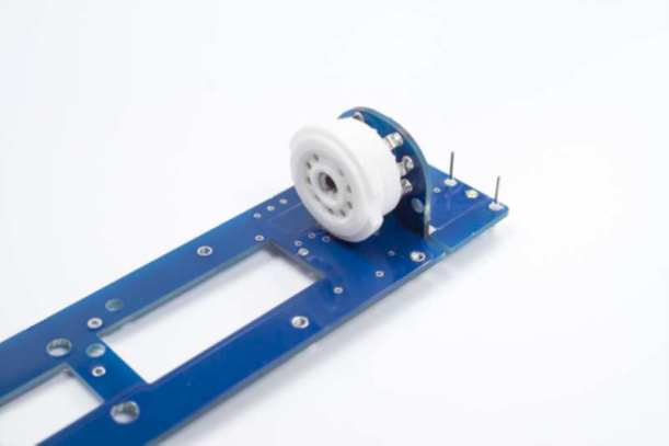 The two D-12 PCB sub-assemblies being joined at a 90-degree angle with the connector pins aligned.